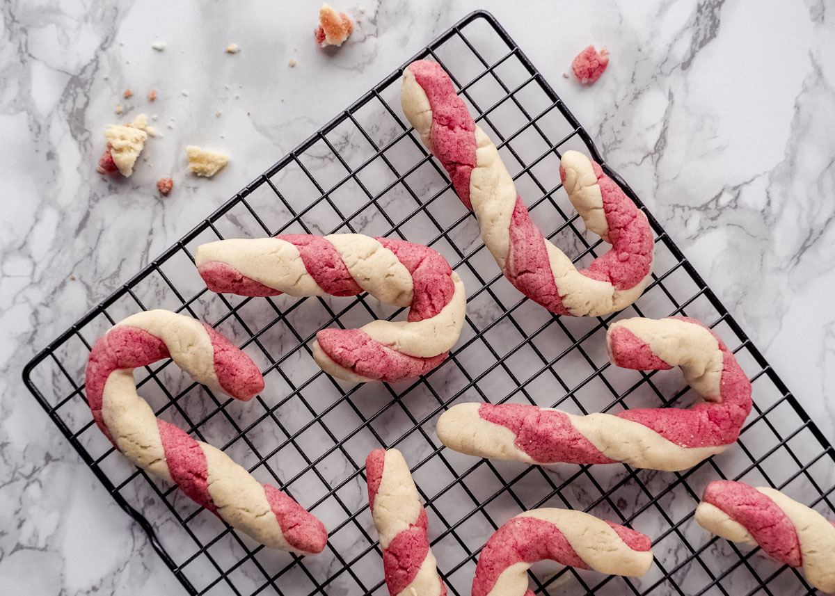 vegan candy cane cookies on cooling rack